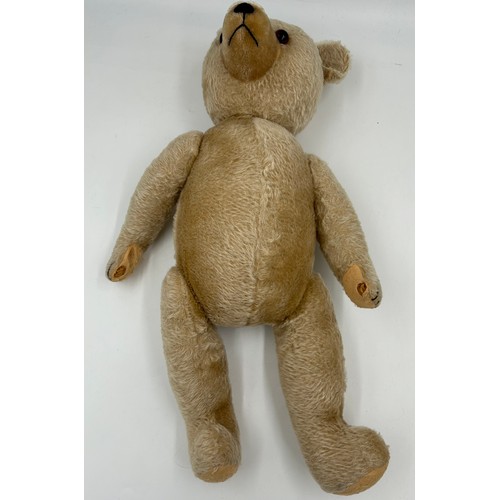 1108 - Two vintage jointed teddy bears. Largest with growler approx. 61cm l, smallest 45cm l.