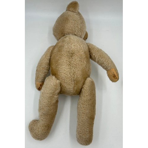 1108 - Two vintage jointed teddy bears. Largest with growler approx. 61cm l, smallest 45cm l.