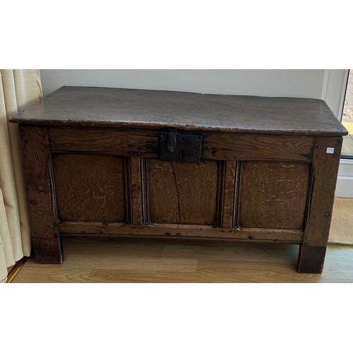 55 - A 17thC oak coffer with iron lock and snipe hinges. 98cm w x 36cm d x 52cm h.