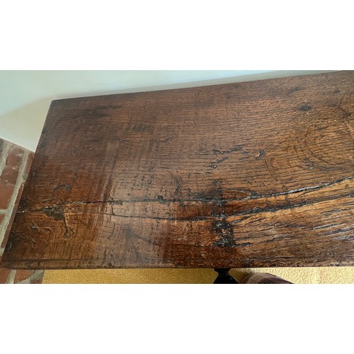 56 - A 17thC oak six plank coffer with linen fold decoration to front. Iron lock. Replacement hinges. 69c... 