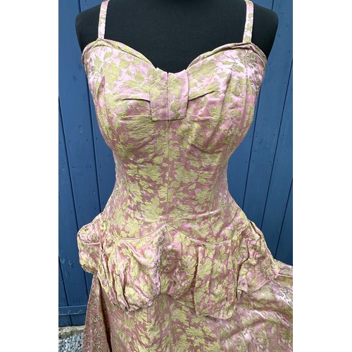 736 - A 1950's Chafil, London full length pink and green demask dress, sleeveless with boned bodice, lined... 