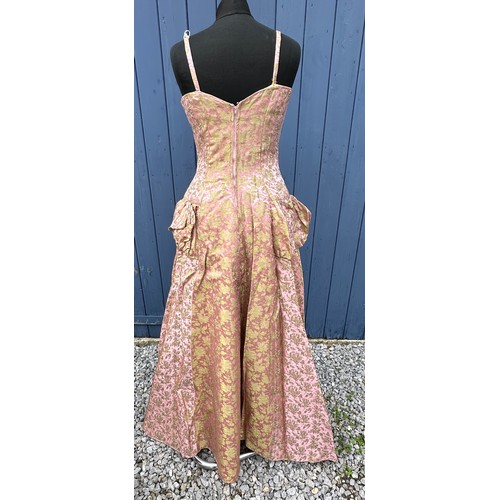 736 - A 1950's Chafil, London full length pink and green demask dress, sleeveless with boned bodice, lined... 