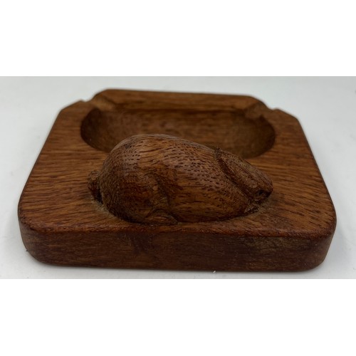 69A - A Peter Heap ‘Rabbitman’ oak ashtray. 10cm x 8.5cm. Marked to underside N with tree.