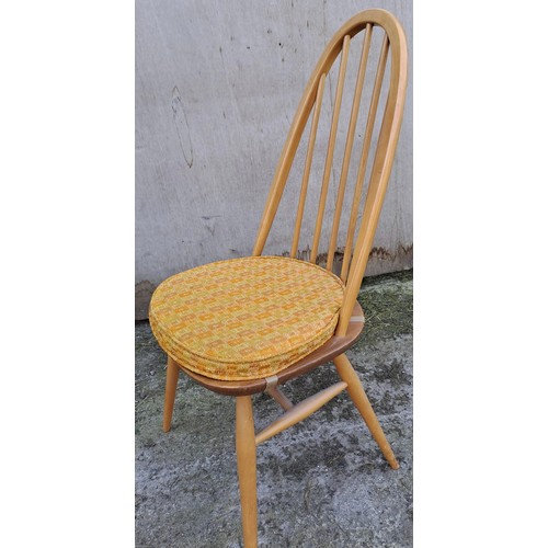 53 - Three mid 20thC Ercol ‘Quaker’ dining chairs.