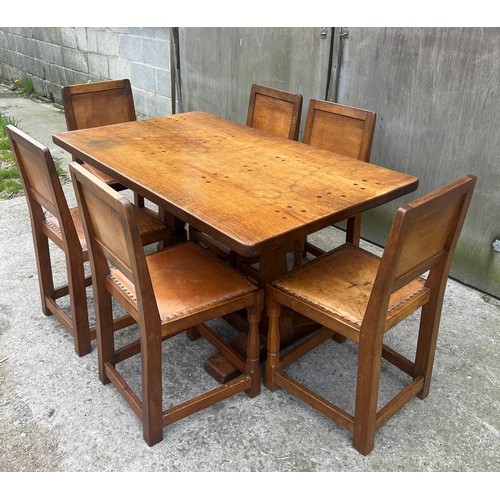 66 - A Robert Thompson ‘Mouseman’ adzed oak dining table and six chairs given by Robert Thompson to his d... 