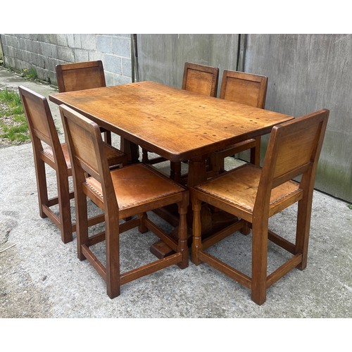 66 - A Robert Thompson ‘Mouseman’ adzed oak dining table and six chairs given by Robert Thompson to his d... 