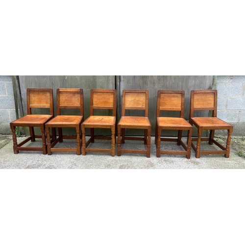 66 - A Robert Thompson ‘Mouseman’ adzed oak dining table and six chairs given by Robert Thompson to his d... 