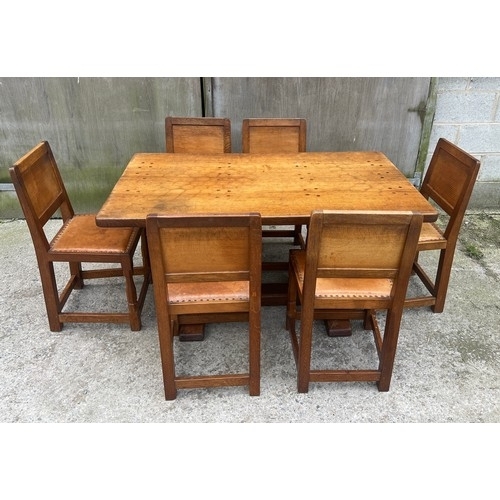 66 - A Robert Thompson ‘Mouseman’ adzed oak dining table and six chairs given by Robert Thompson to his d... 