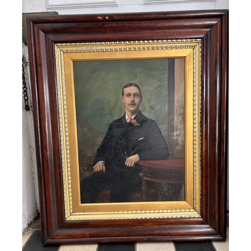 1410 - A large 19thC oil on board, portrait of an unknown seated gentleman. Image 57 x 43cm.