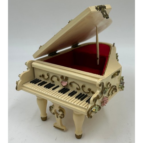 309 - Three Reuge German musical boxes to include a Grand Piano (Doctor Zhivago theme), a Rocking Cradle (... 