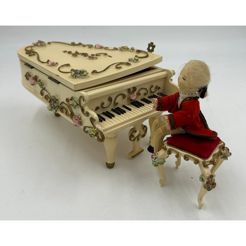 309 - Three Reuge German musical boxes to include a Grand Piano (Doctor Zhivago theme), a Rocking Cradle (... 