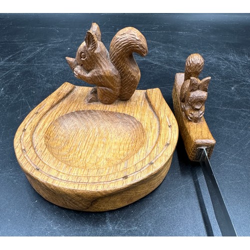 73 - Squirrel Man- Trevor Hutchinson - An oak horseshoe ashtray, 12 w x 13 d x 8cm h H7cm together with a... 