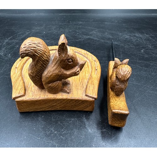 73 - Squirrel Man- Trevor Hutchinson - An oak horseshoe ashtray, 12 w x 13 d x 8cm h H7cm together with a... 