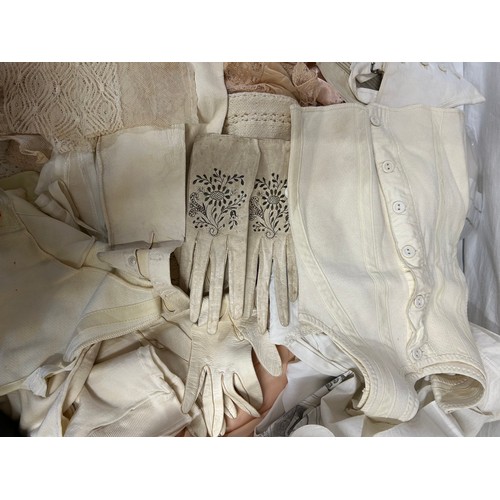 741 - Large quantity of silk, linen and cotton undergarments to include bodices, bloomers, vests, gloves, ... 