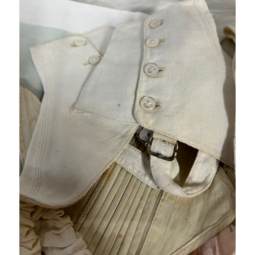 741 - Large quantity of silk, linen and cotton undergarments to include bodices, bloomers, vests, gloves, ... 