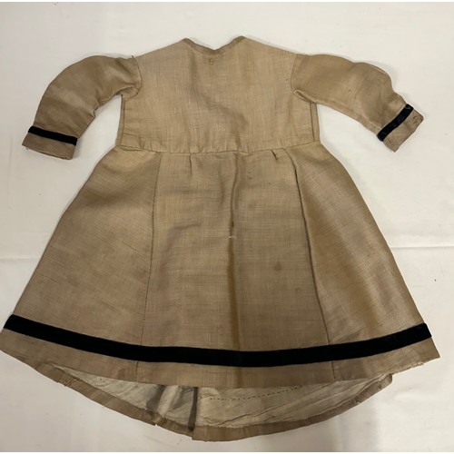 742 - Two Victorian items of clothing to include a child’s dress in brown with black velvet trim, lace sle... 