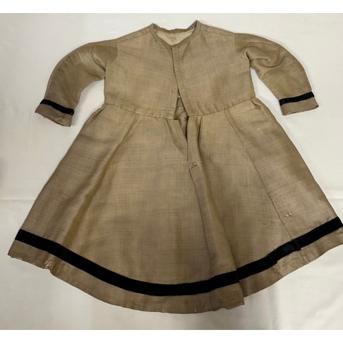 742 - Two Victorian items of clothing to include a child’s dress in brown with black velvet trim, lace sle... 