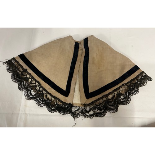 742 - Two Victorian items of clothing to include a child’s dress in brown with black velvet trim, lace sle... 