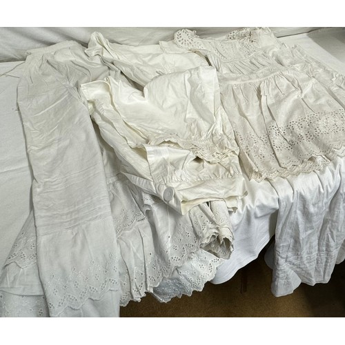 733 - A quantity of 19thC cotton garments to include 2 pairs of bloomers, a baby's dress, a petticoat, a n... 