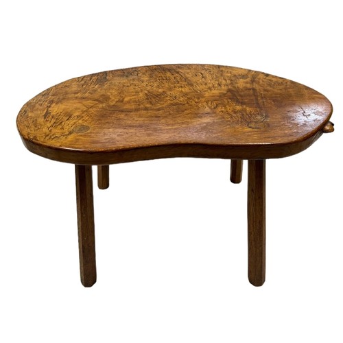 65 - A Robert Thompson, ‘Mouseman’ kidney shaped burr oak table on four octagonal legs with signature mou...