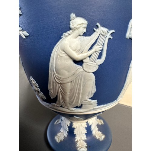 185 - A pair of Wedgwood Jasperware vases, 23cm h.