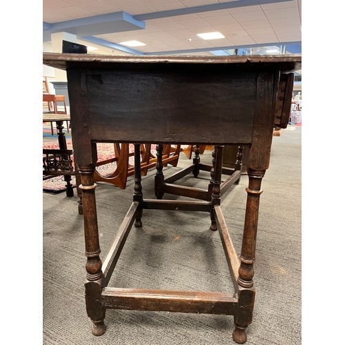 51 - An 18thC oak side table with single drawer to front. 91cm w x 56cm d x 74cm h.