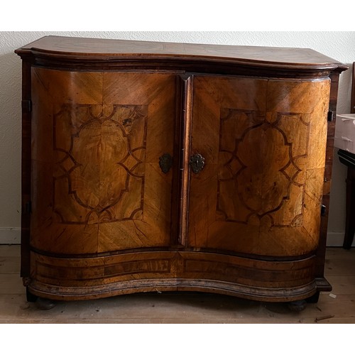 125 - An 18thC Austrian two door inlaid cabinet with sloping top and drawer to base. 109cm w x 94cm h x 48... 