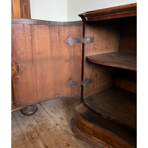 125 - An 18thC Austrian two door inlaid cabinet with sloping top and drawer to base. 109cm w x 94cm h x 48... 