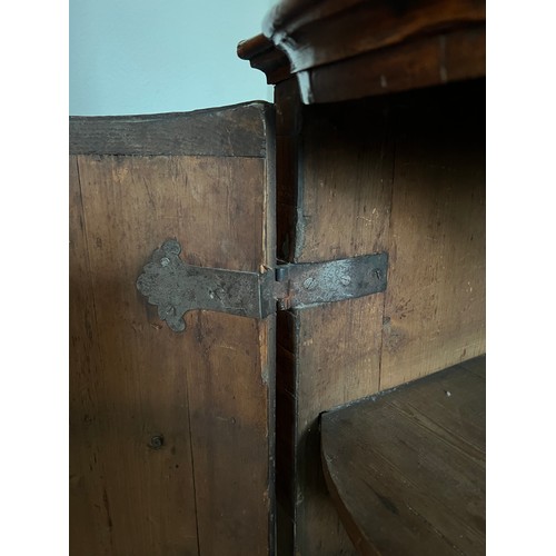 125 - An 18thC Austrian two door inlaid cabinet with sloping top and drawer to base. 109cm w x 94cm h x 48... 