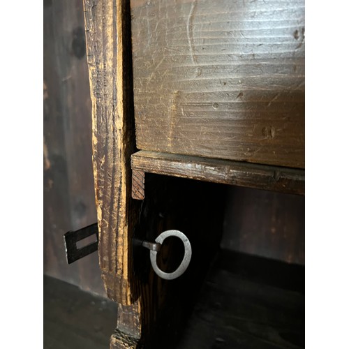 126 - An 18thC Austrian inlaid two door wardrobe on bun feet. Dated 1727 to the top. 202cm h x 57cm d x 17... 