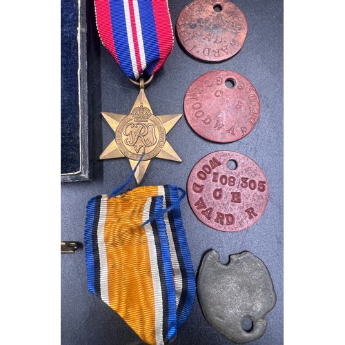 1036 - A WW I/II group of 5 medals to include The Africa Star, Victory Medal, Battle of Britain Star, WW I ... 