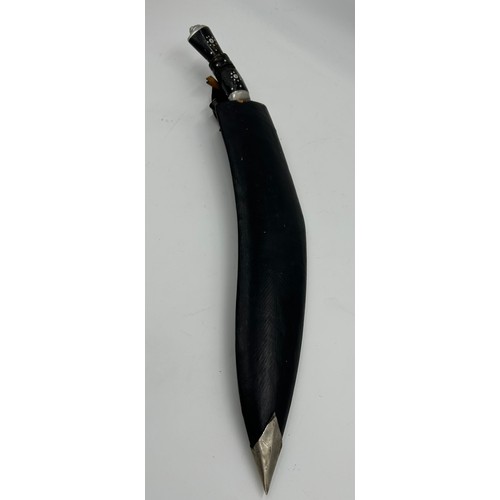 1037 - Kukri with curved 39cm blade engraved India, in leather covered scabbard with two skinning knives.