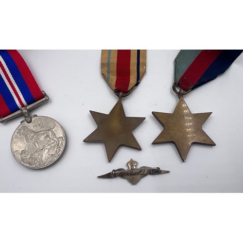 1038 - World War medals to include The Africa Star, The 1939-1945 Star and campaign medal.