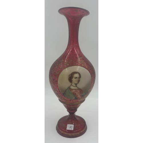 407 - A 19thC bohemian glass vase with gilt decoration and a painted plaque to the front depicting an eleg... 