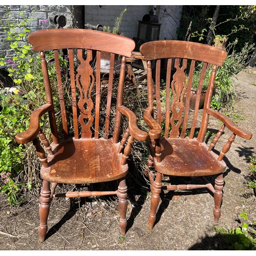 135 - Two 20thC Yorkshire slat back armchairs. Height to back 116cm.