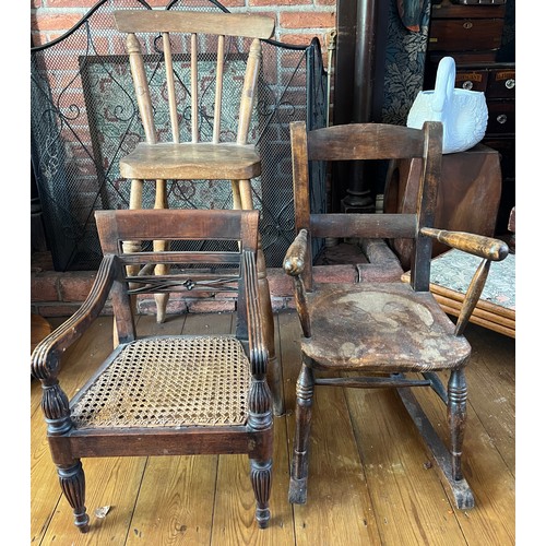 118 - Three vintage children’s chairs to include rocker, cane seated armchair and a high chair, height to ... 