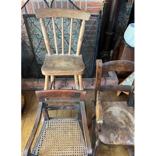 118 - Three vintage children’s chairs to include rocker, cane seated armchair and a high chair, height to ... 