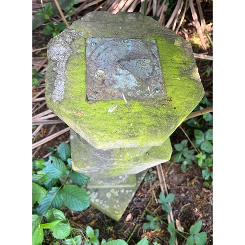 8 - A vintage stone sundial on column. 72cm h.