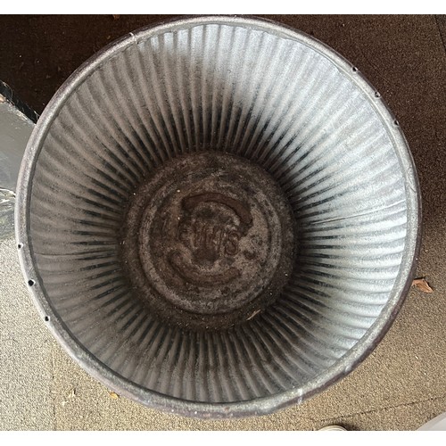 9 - A galvanised metal washtub. 53cm h.