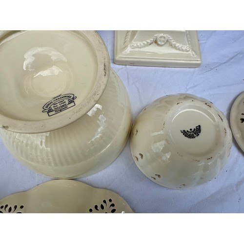 342 - A selection of 20thC Royal Creamware to include 2 x candlesticks 22.5cm h, 8 x plates 27.5cm d, 8 x ... 