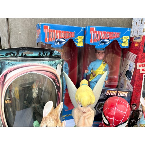 1053 - A mixture of toys to include 4 x boxed Thunderbirds, Harry Potter Ultimate, Dueling Battle Trainer, ... 