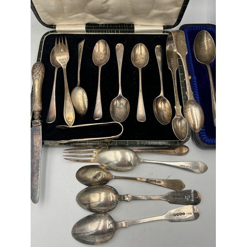 820 - A large quantity of hallmarked silver to include Georgian sugar tongs, spoons etc. Total weight 300g... 