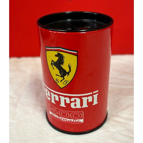 896 - Ferrari interest to include Polo top, 2 x Ferrari caps and a Jaguar together with a Ferrari flag, mo... 