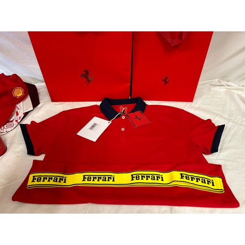 896 - Ferrari interest to include Polo top, 2 x Ferrari caps and a Jaguar together with a Ferrari flag, mo... 