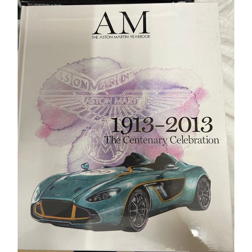 963 - A large collection of books relating to automobilia to include Ferrari, Aston Martin, Lamborghini, J... 