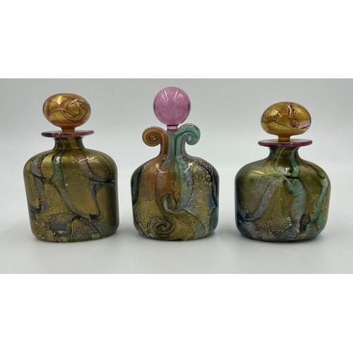 468 - Isle of Wight Studio Glass designed by Timothy and Jonathan Harris, seven perfume bottles with stopp... 