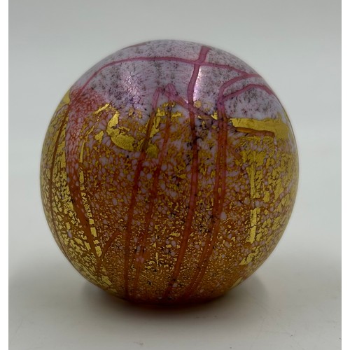 483 - A rare 'Pink Fizz' Isle of Wight studio glass globe paperweight from 1987 designed by Timothy Harris... 