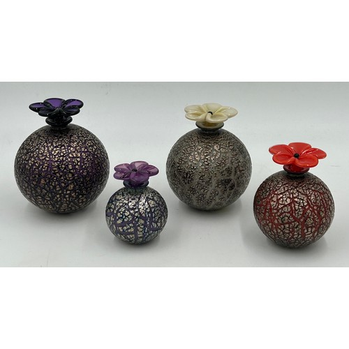 507 - Isle of Wight studio glass 'Crizzle' globe perfume bottles with flower stoppers designed by Timothy ... 