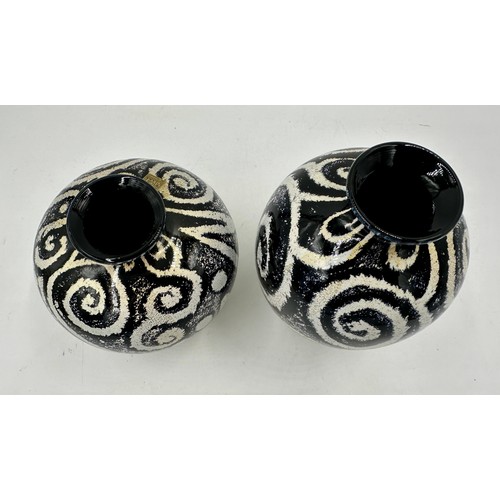 551 - Two Isle of Wight studio glass vases in the 'Jazzy Monochrome' pattern designed by Timothy Harris. B... 