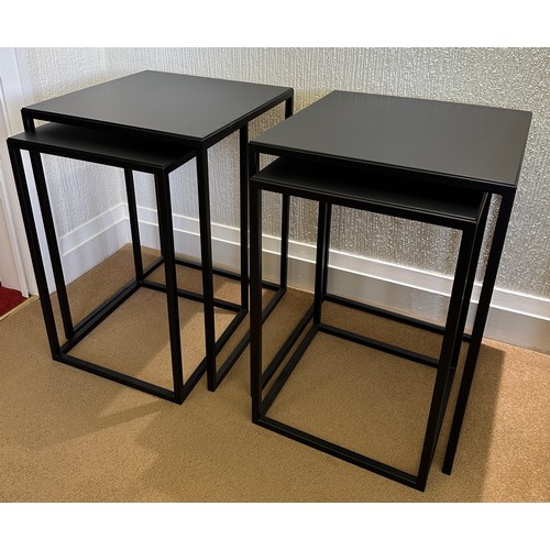 105 - A pair of Linton handcrafted, solid steel side tables that neatly nest together.